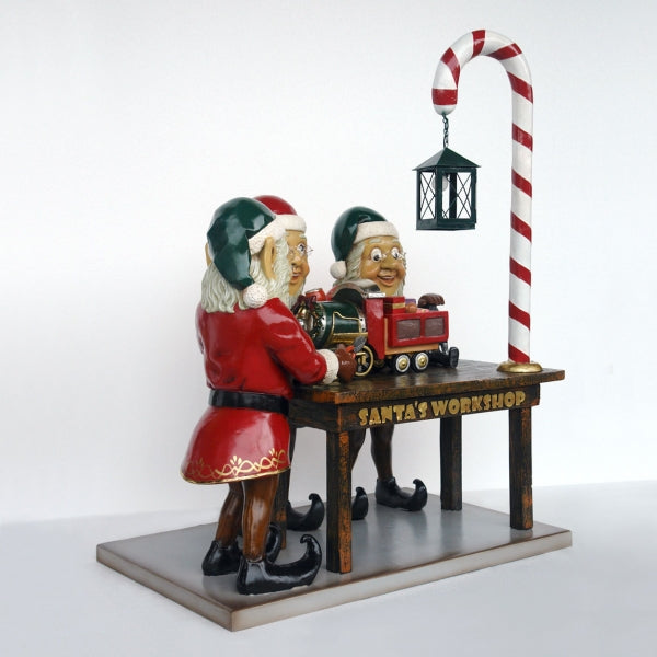 Three Elves in Santa's Workshop Life Size Statue