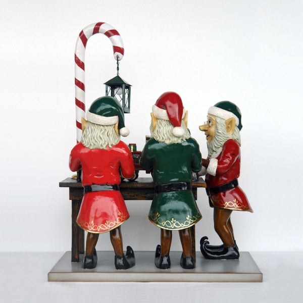 Three Elves in Santa's Workshop Life Size Statue