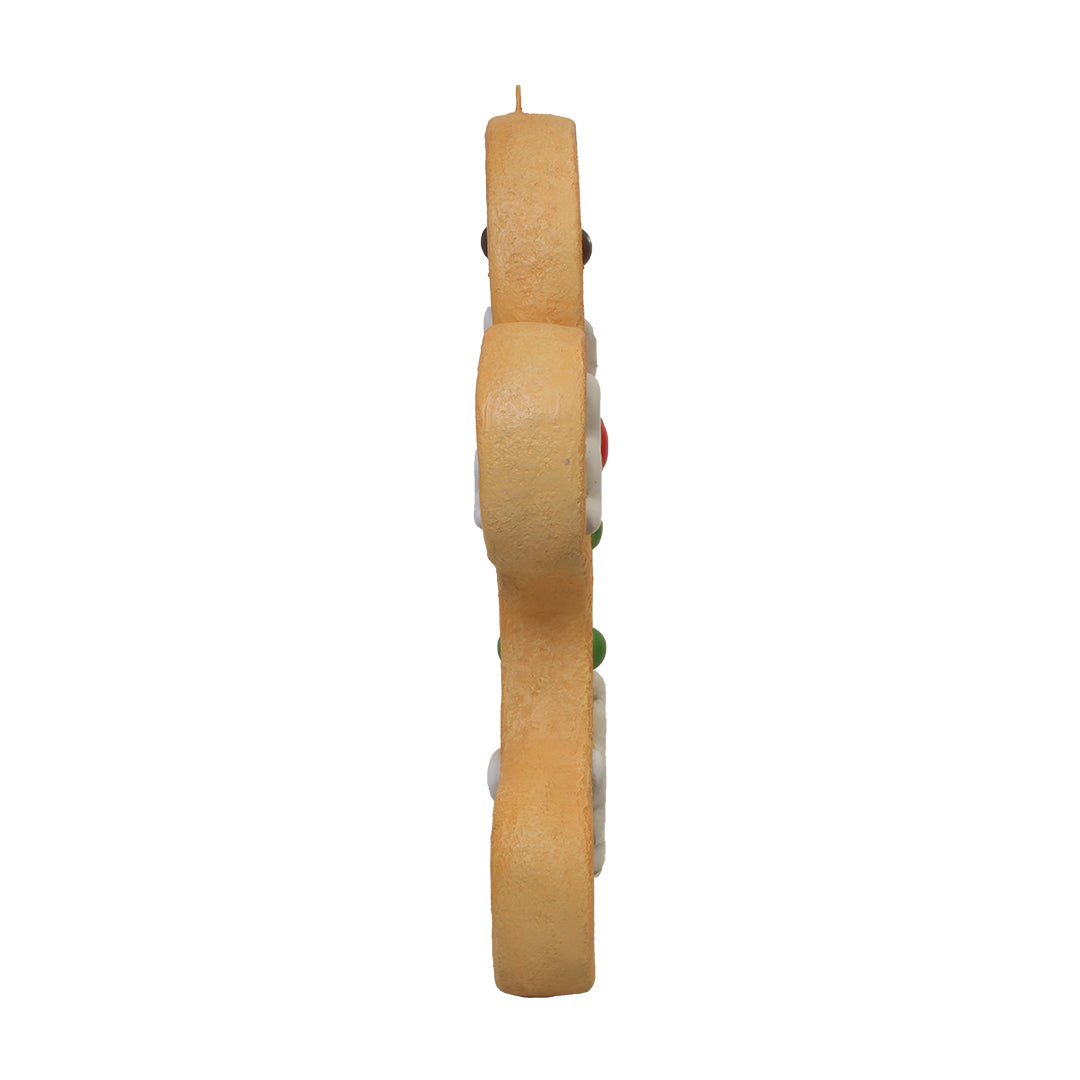 Gingerbread Man Hanging Over Sized Statue