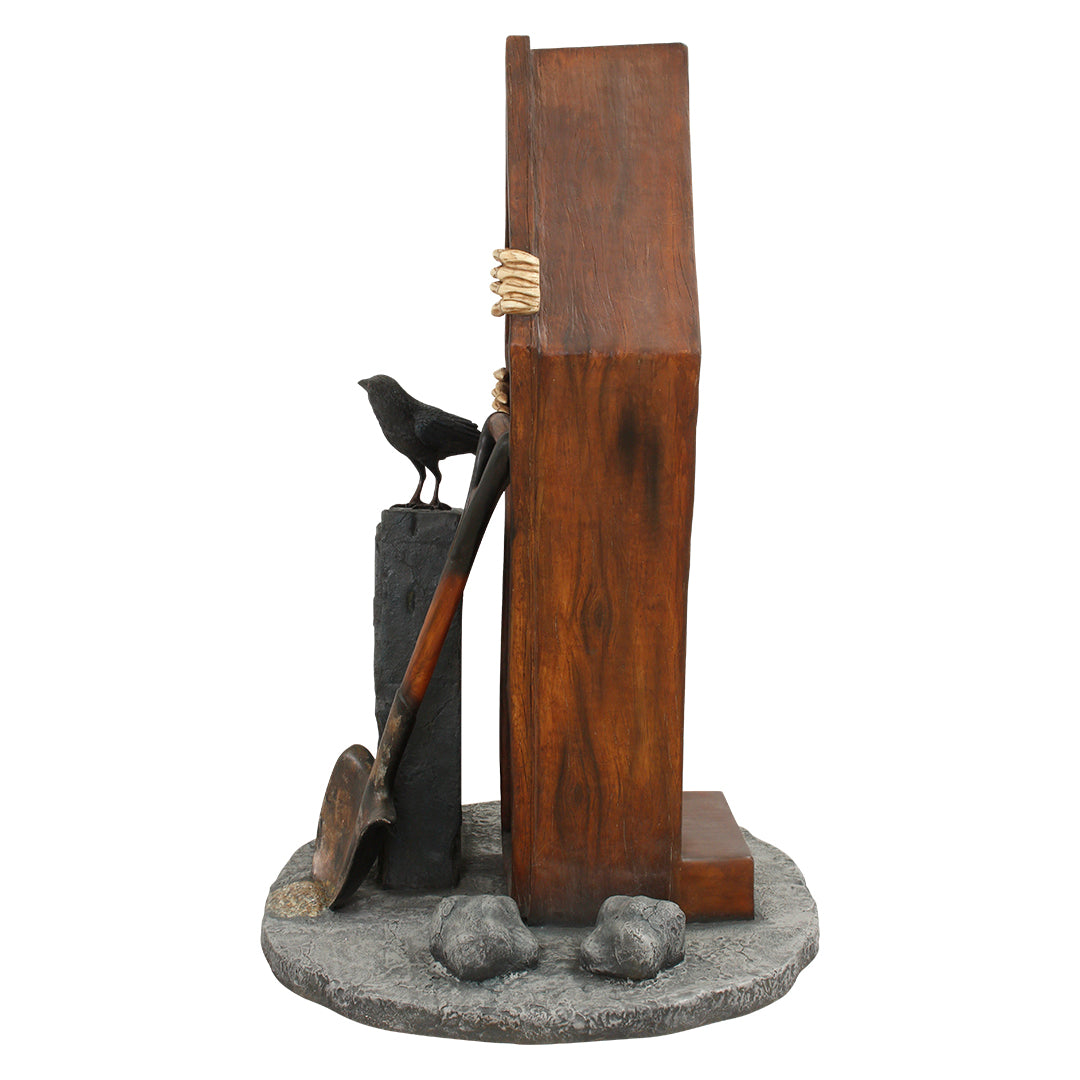 Coffin Photo Op Statue