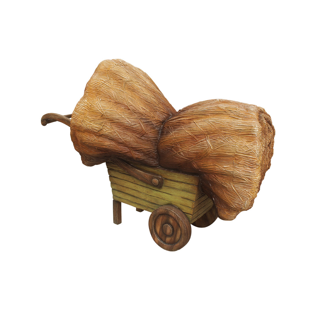 Wheel Barrow With Hay Over Sized Statue